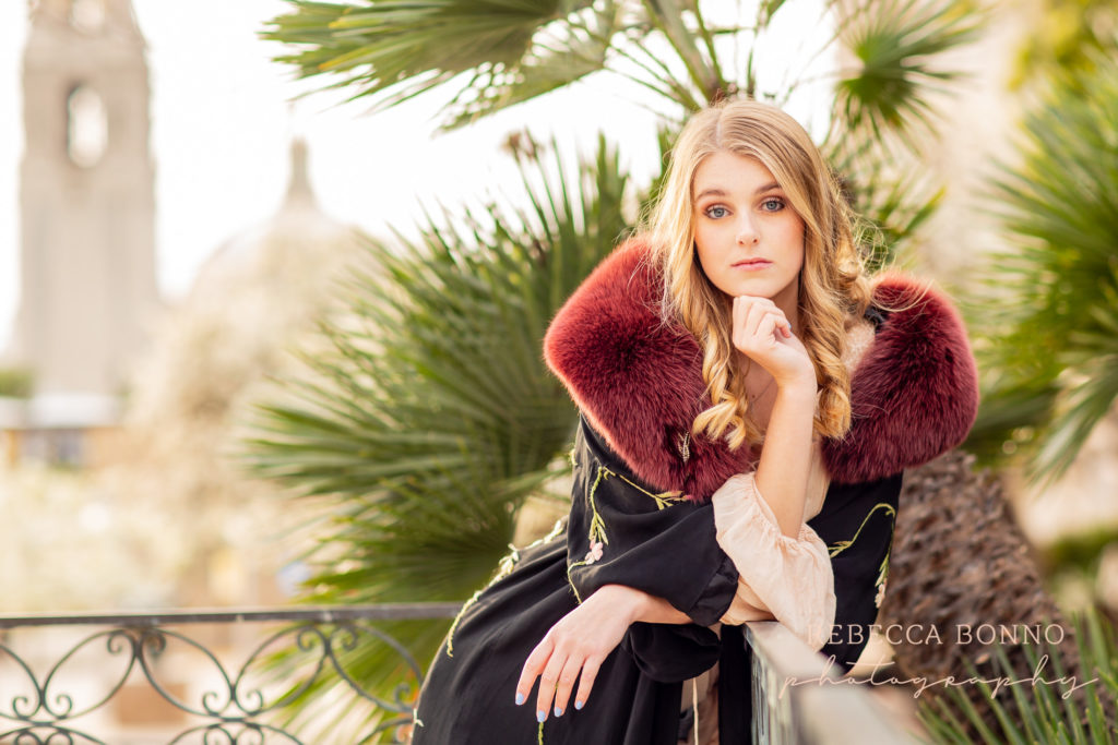 fun senior session with red fur jacket  and rebecca bonno Photography 