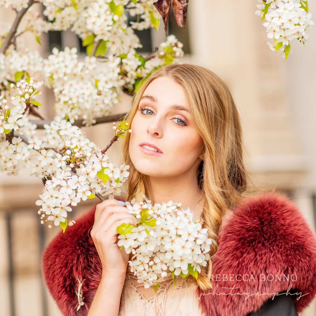 senior session in white cherry blossoms with rebecca Bonno photography 